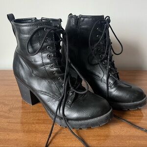 Black heeled lace up combat boots